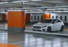 white bmw m 3 parked in garage